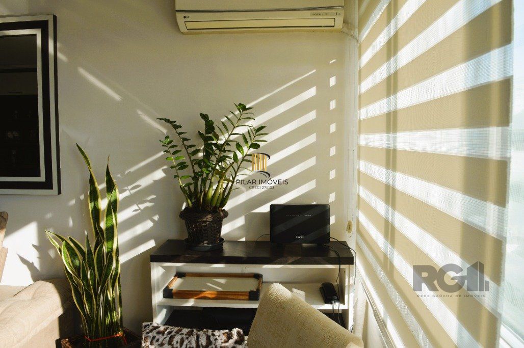 Impecável apto. 2 dormitórios -1 suíte, semimobiliado com linda vista e próximo ao Catamarã no Centro de Guaiba