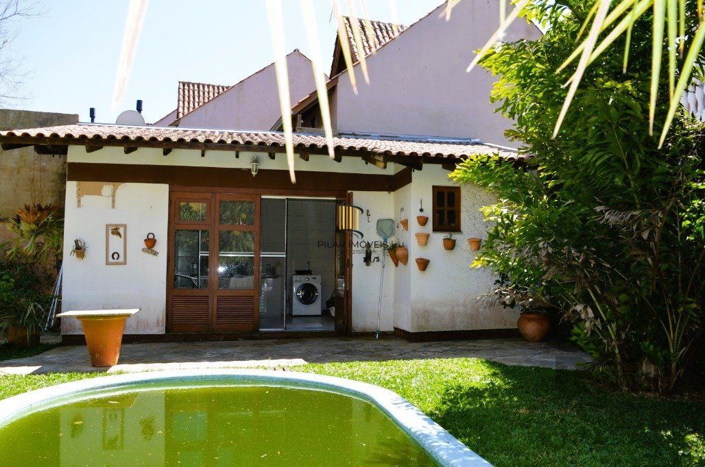MAGNÍFICA MANSÃO ANOS 90 A BEIRA DO GUAÍBA NA ZONA SUL DE PORTO ALEGRE!