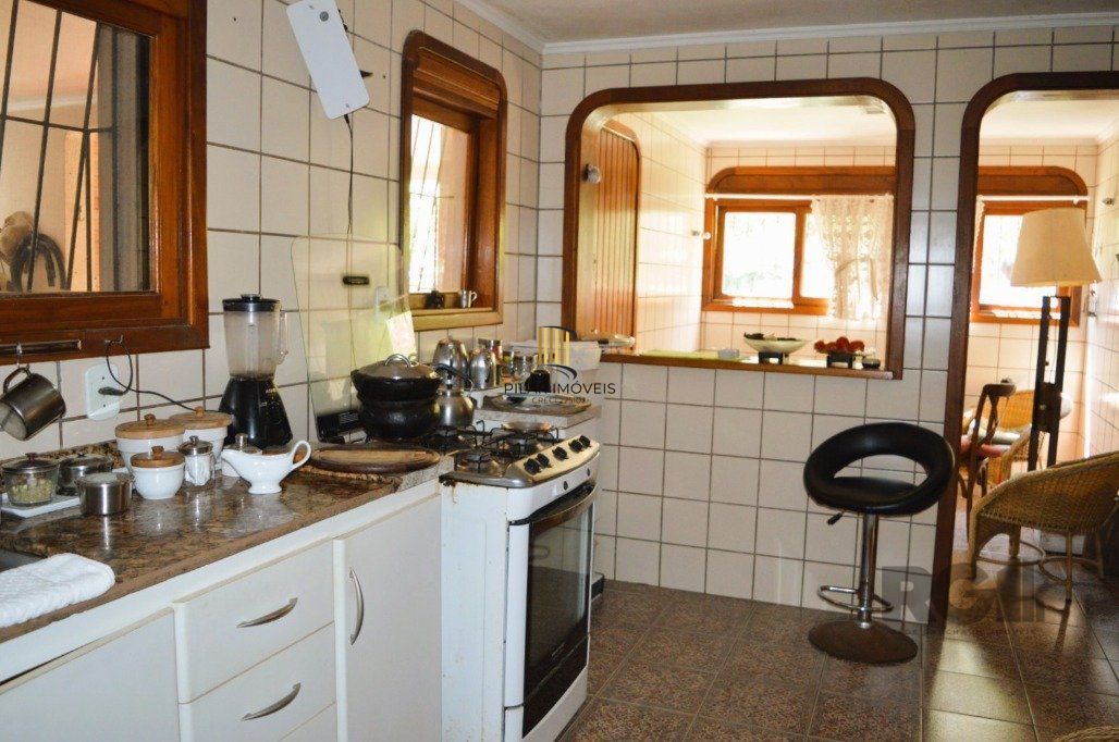 MAGNÍFICA MANSÃO ANOS 90 A BEIRA DO GUAÍBA NA ZONA SUL DE PORTO ALEGRE!
