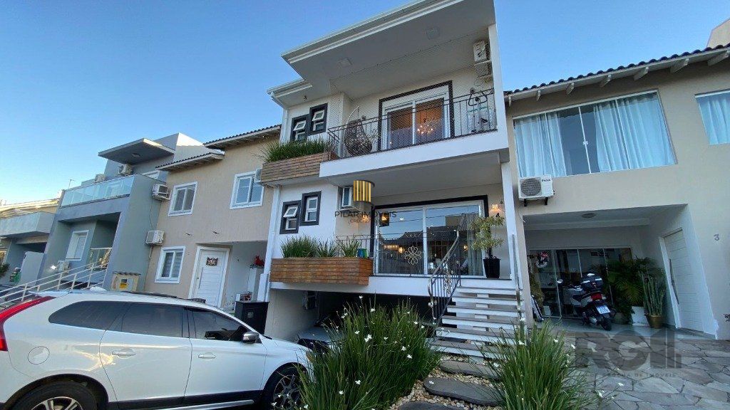 Casa de Condomínio 4 dormitórios no bairro Passo das Pedras