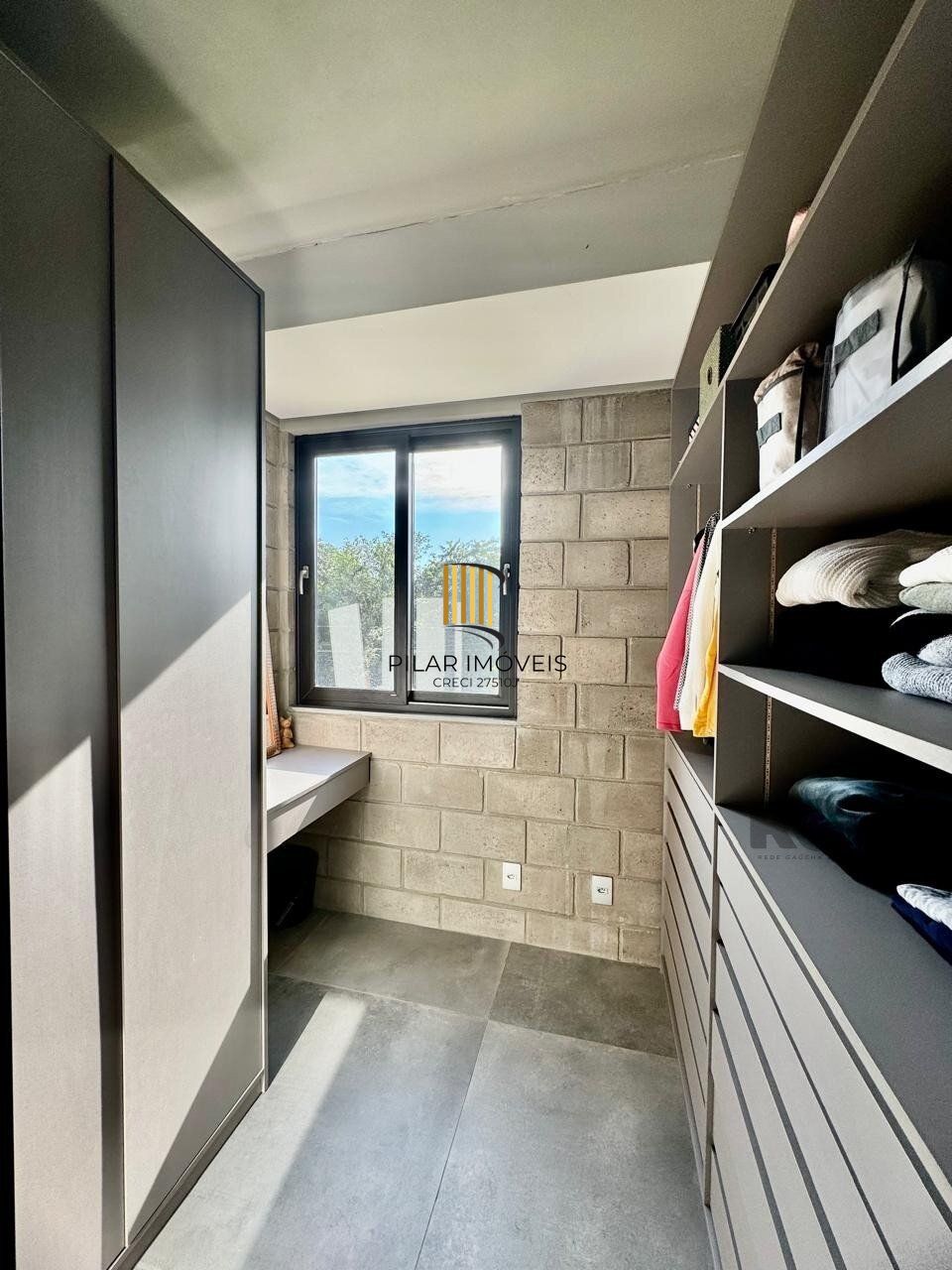 Casa 3 dormitórios no bairro Guarujá
