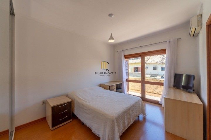 Casa de Condomínio 3 dormitórios no bairro Cavalhada