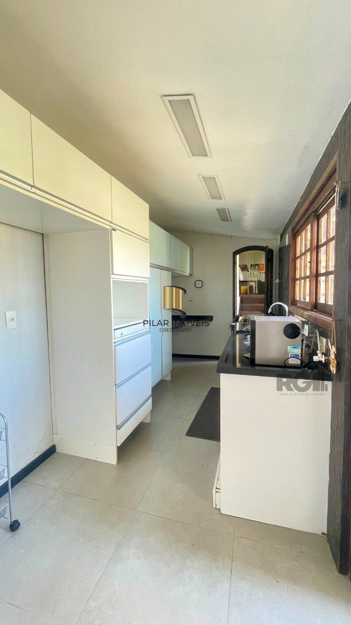 Casa de Condomínio 3 dormitórios no bairro Cristal