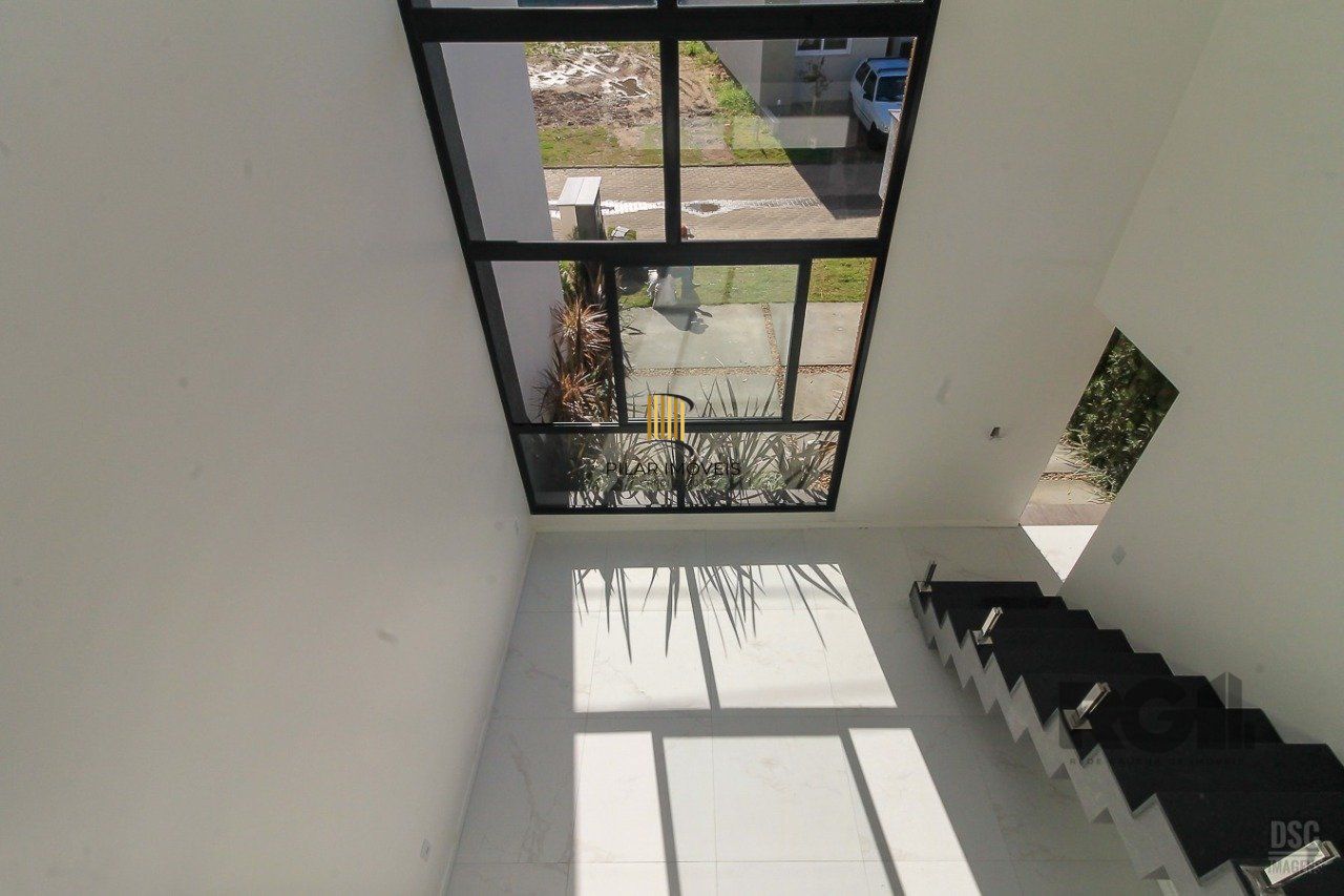 Casa de Condomínio 3 dormitórios no bairro Ipanema