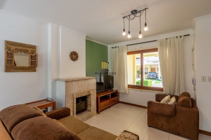 Casa de Condomínio 3 dormitórios no bairro Cavalhada