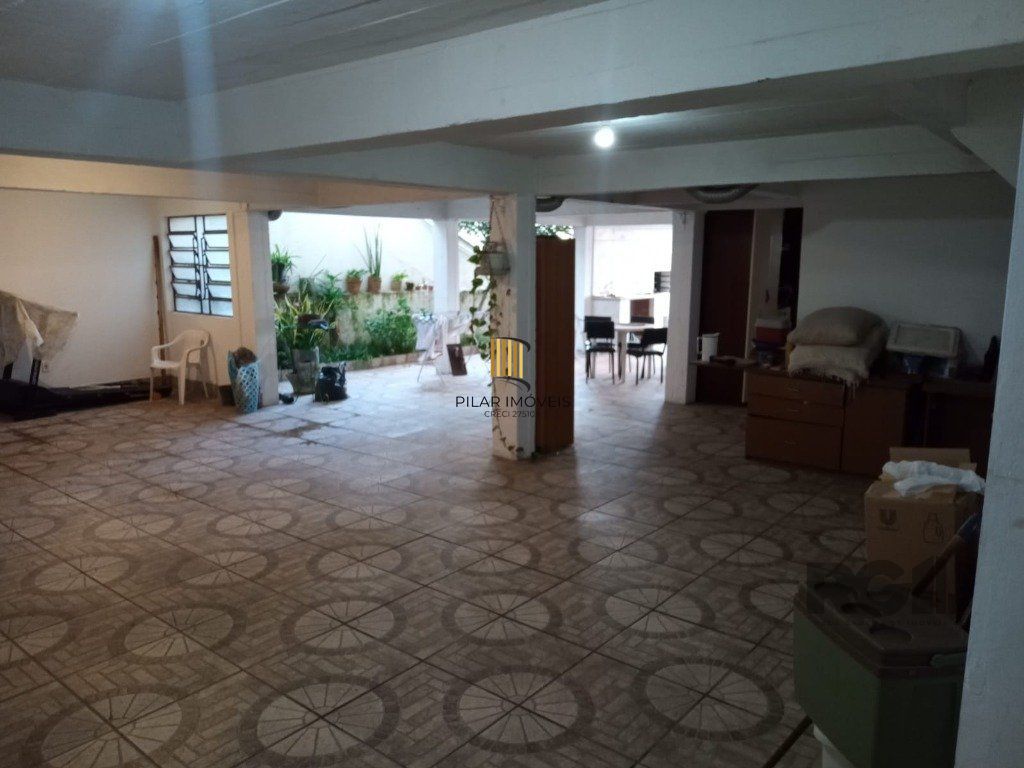 Casa 4 dormitórios no bairro Santo Antônio
