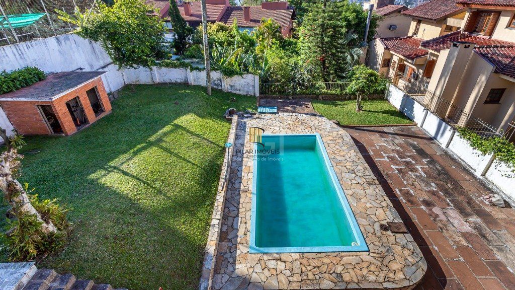 Casa 5 dormitórios no bairro Santa Tereza