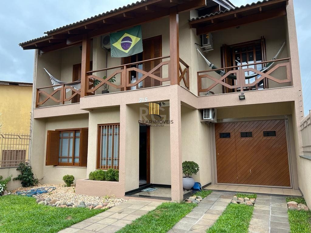 Casa 3 dormitórios no bairro Jardim Sabará - Pilar Imóveis