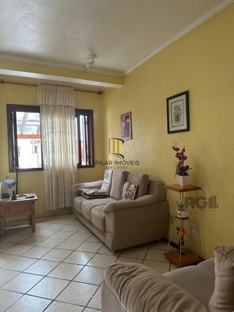 sobrado com 02 dormitórios, living, lavabo, banheiro social,  cozinha com área de serviço e pateo. - Pilar Imóveis