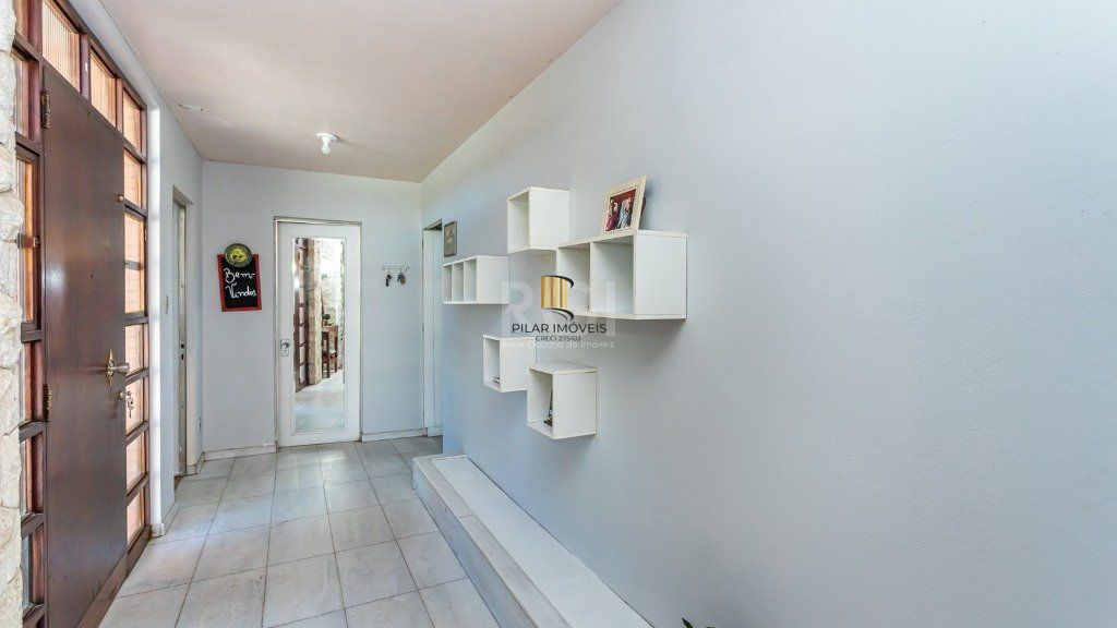 Casa 5 dormitórios no bairro Santa Tereza