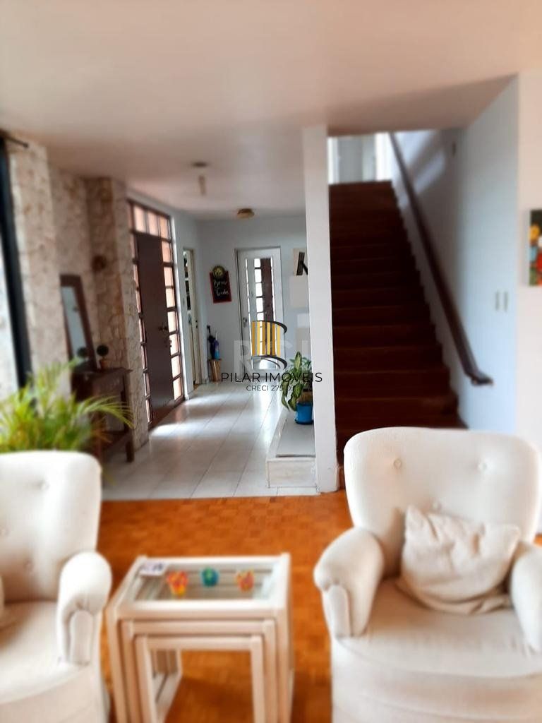 Casa 5 dormitórios no bairro Santa Tereza
