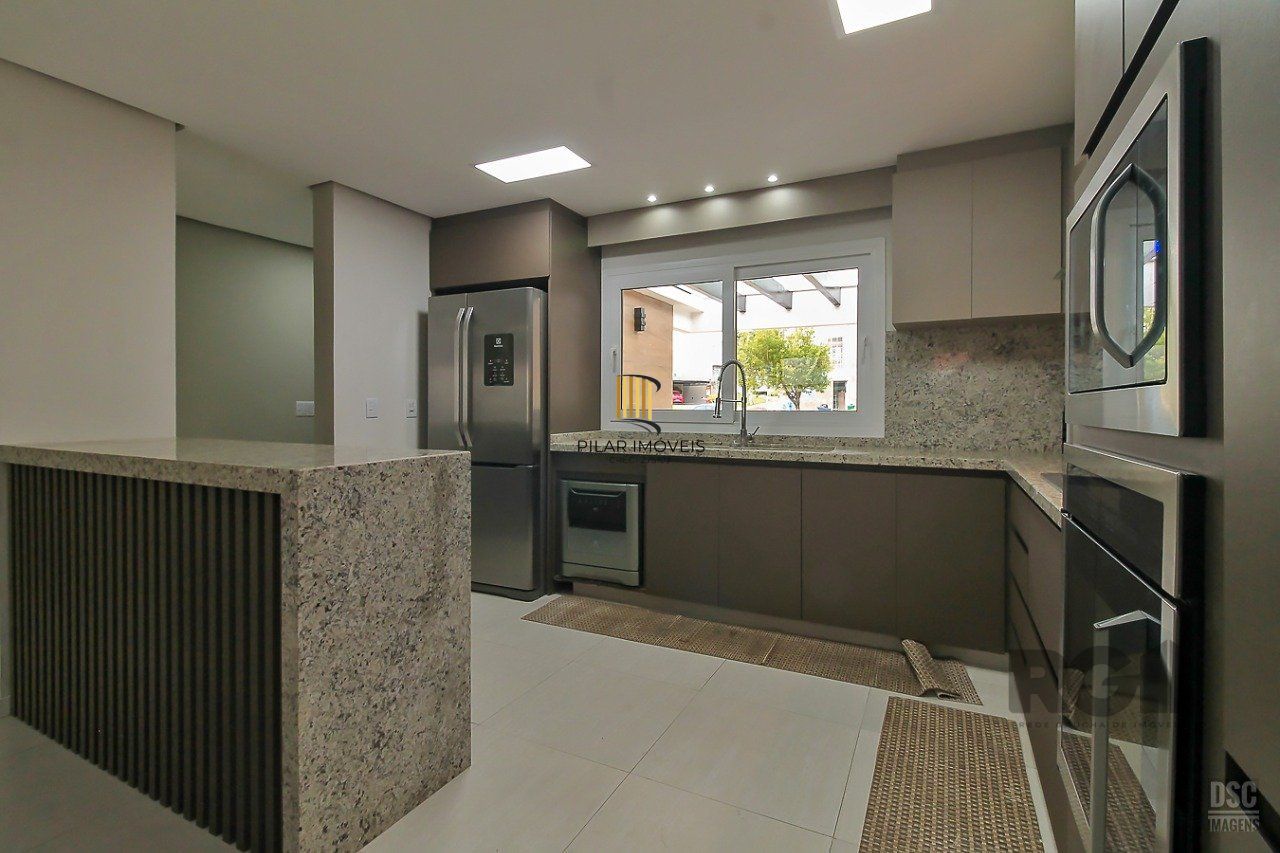 Casa de Condomínio 3 dormitórios no bairro Vila Nova
