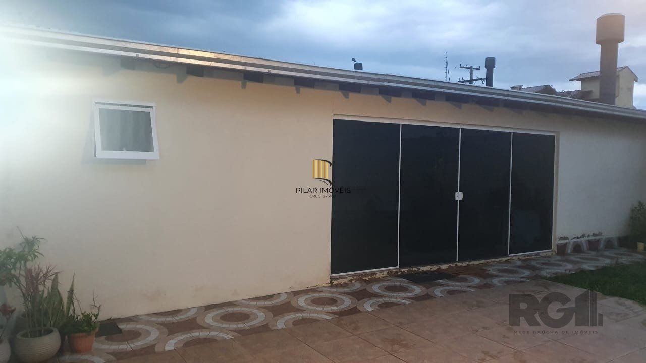 Casa 3 dormitórios no bairro Guarujá