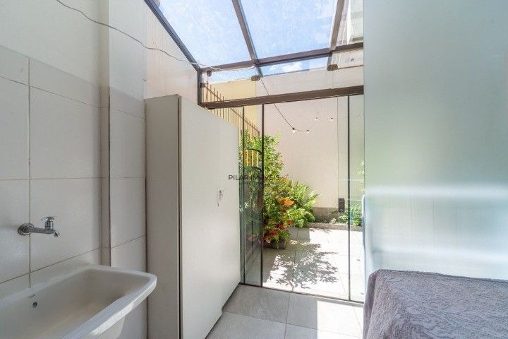 Casa de Condomínio 3 dormitórios no bairro Cavalhada