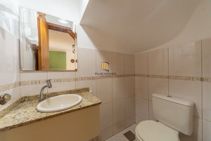 Casa de Condomínio 3 dormitórios no bairro Cavalhada