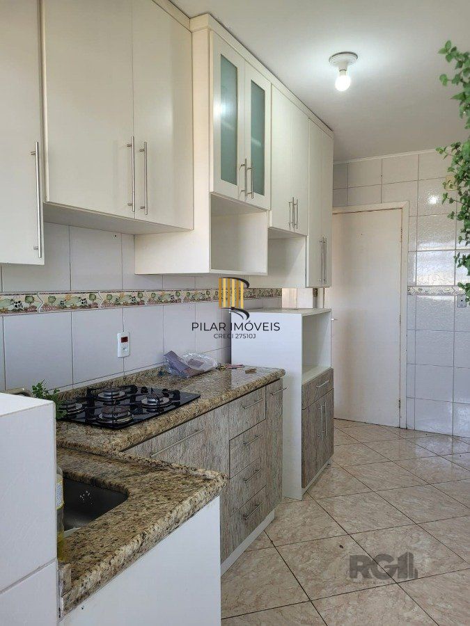 Apartamento 2 dormitórios com vaga no Bairro Cristal.