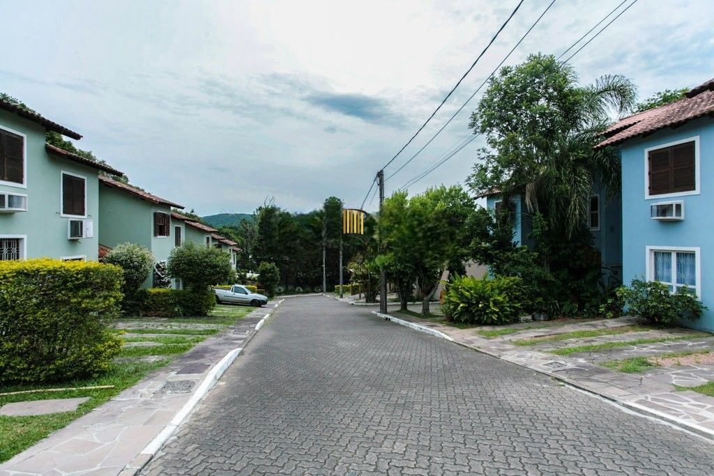 Casa de Condomínio 3 dormitórios no bairro Lomba do Pinheiro