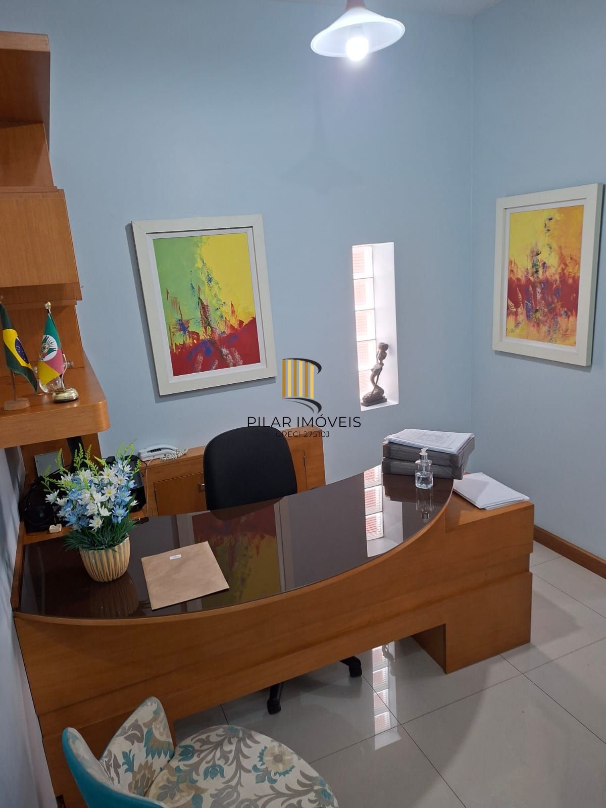 Sala com 41,14 me com uma vaga escriturada e coberta