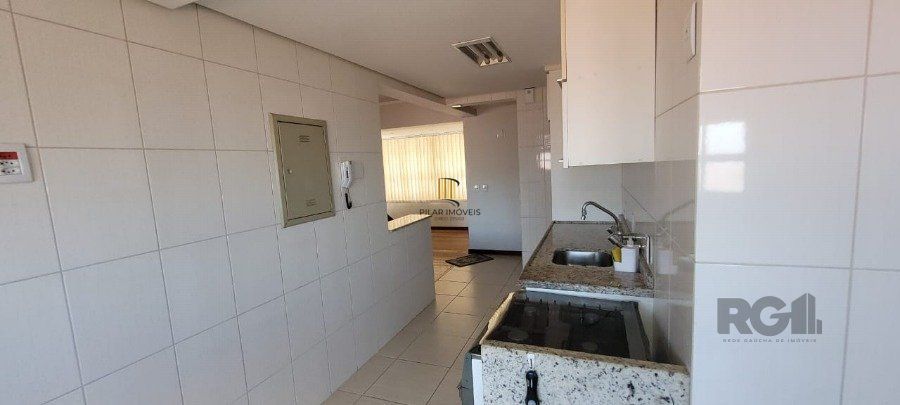 Apartamento de 2 dormitórios grande com suite, sacada fechada com churrasqueira, elevador, garagem, no Bairro São João / Higienópolis