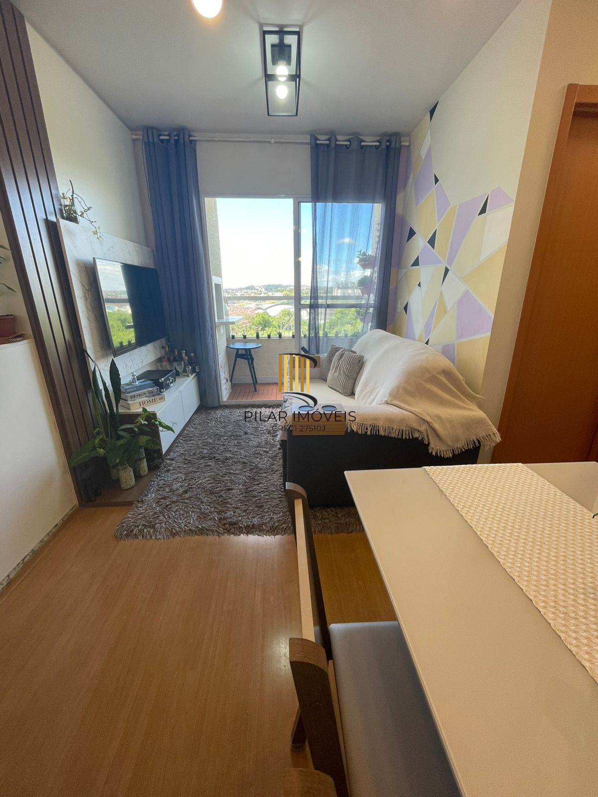 Apartamento 02 dormitórios com sacada com churrasqueira - Pilar Imóveis