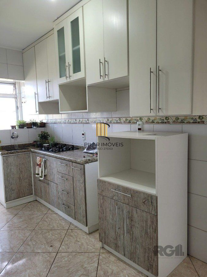 Apartamento 2 dormitórios com vaga no Bairro Cristal.