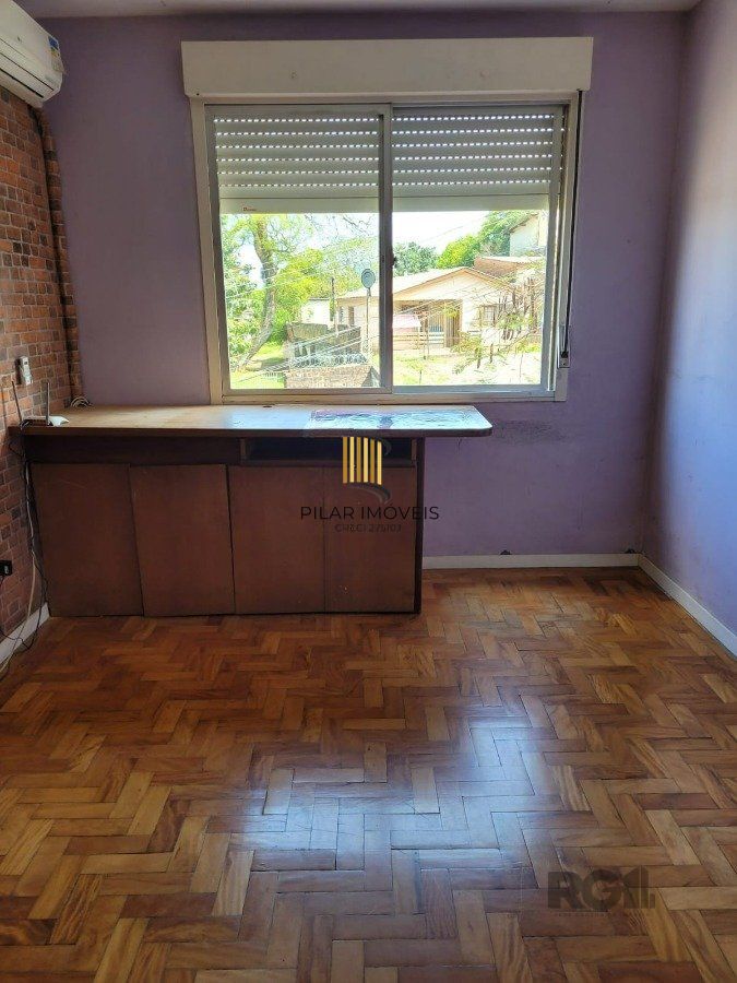 Apartamento 2 dormitórios com vaga no Bairro Cristal. - Pilar Imóveis