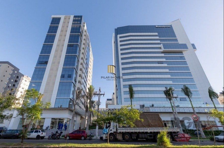 AMPLO CONJUNTO COMERCIAL COM 81 M2  NO HOM NILO - Pilar Imóveis