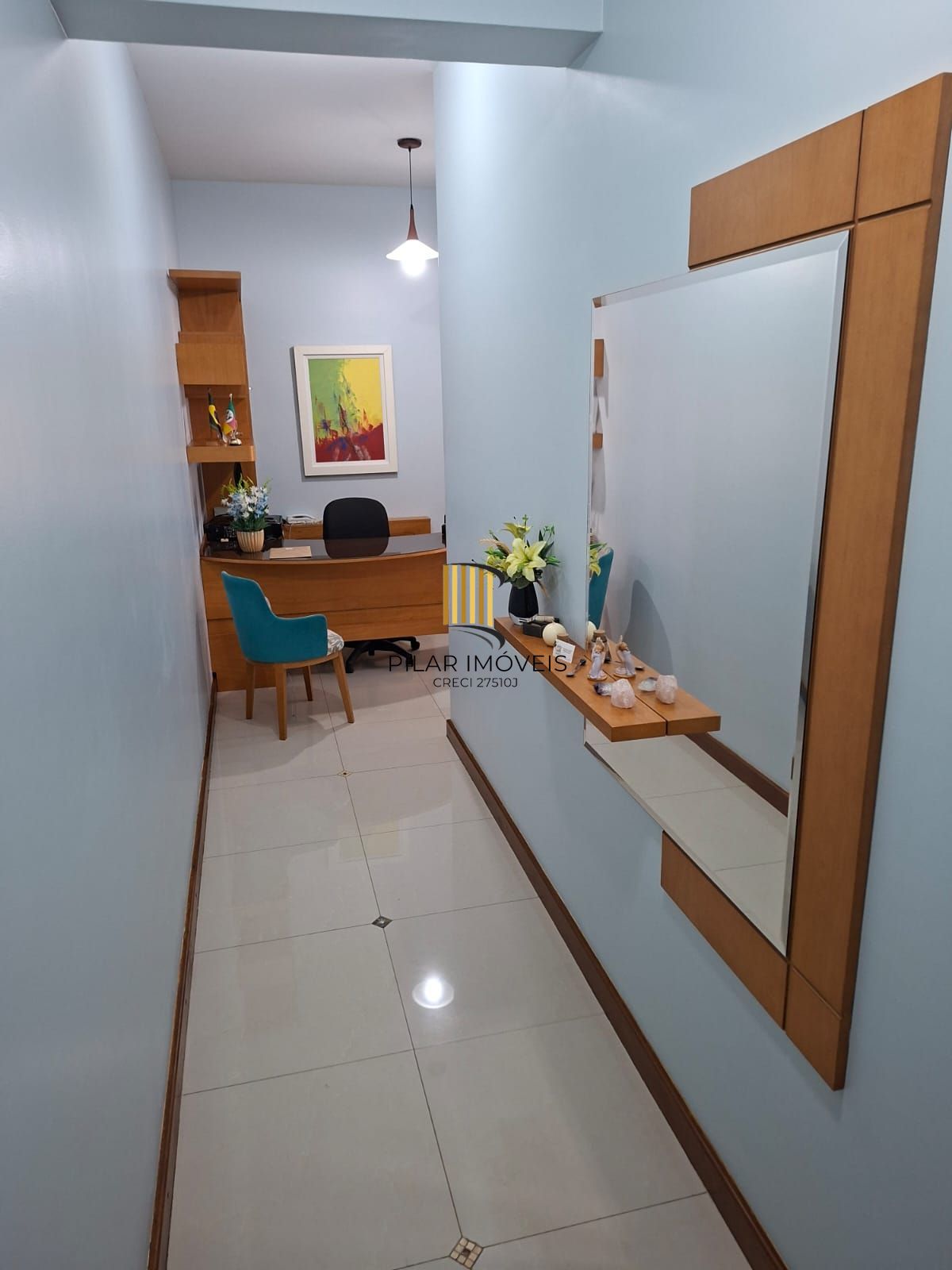 Sala com 41,14 me com uma vaga escriturada e coberta