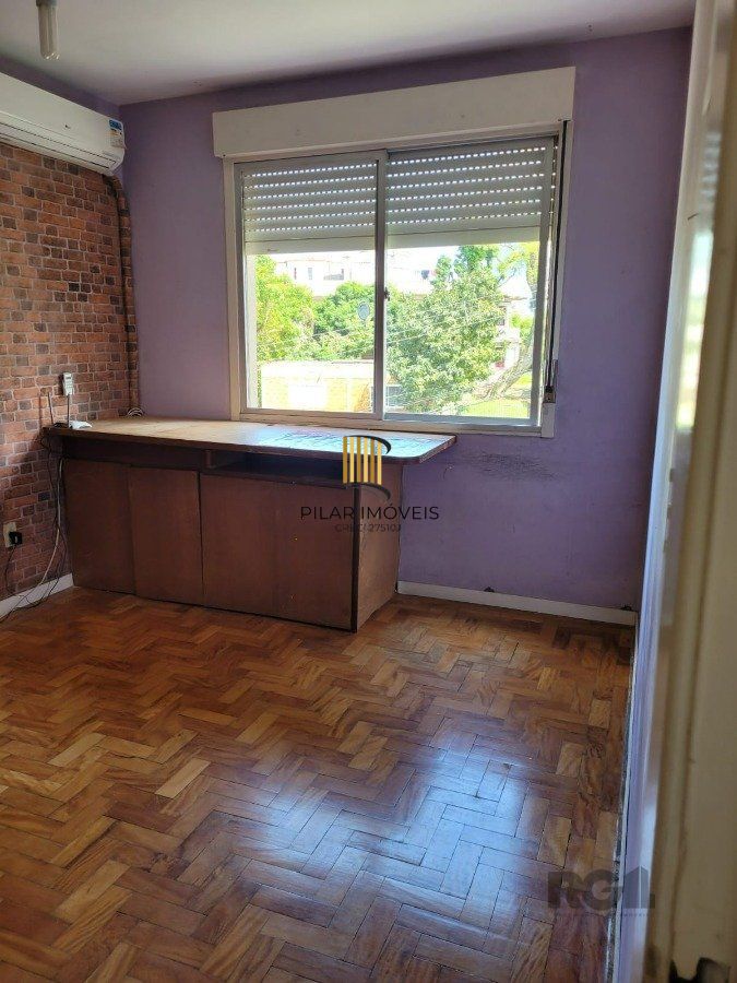Apartamento 2 dormitórios com vaga no Bairro Cristal.