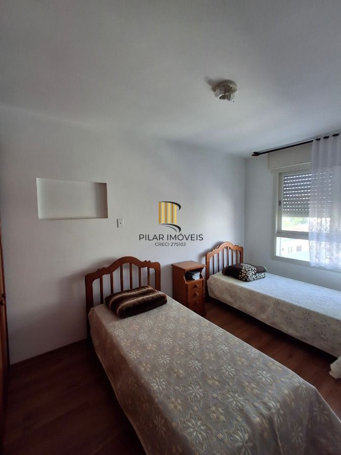 Apartamento de 2 dormitórios 76,90 m² de área privativa, com living para 2 ambientes com piso em tabuão