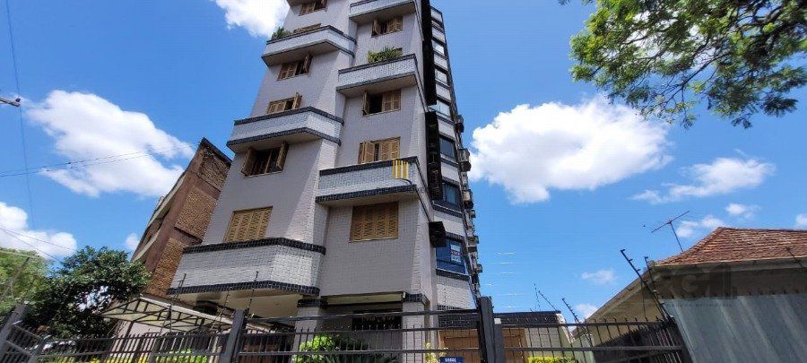 Apartamento de 2 dormitórios grande com suite, sacada fechada com churrasqueira, elevador, garagem, no Bairro São João / Higienópolis