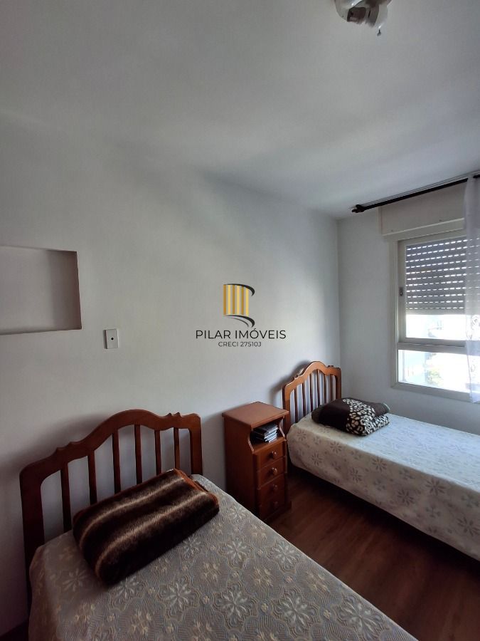 Apartamento de 2 dormitórios 76,90 m² de área privativa, com living para 2 ambientes com piso em tabuão