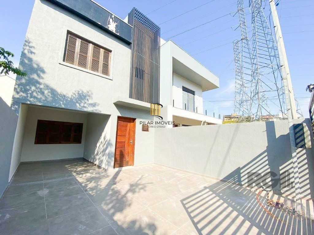 Casa de 3 dormitórios no bairro Mário Quintana
