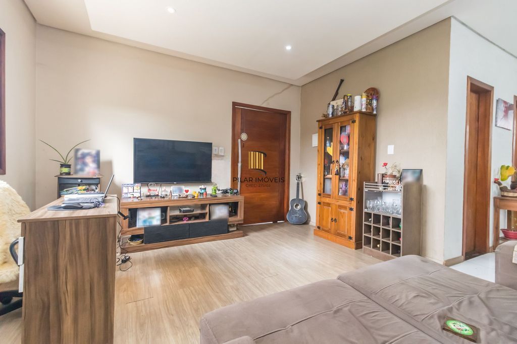 Casa de 6 dormitórios à venda Bairro Vila Nova - Porto Alegre