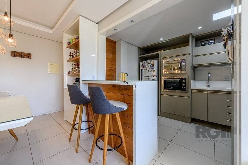 Apartamento 68 m² mobiliado, 2 dormitórios, sendo 1 suíte e 1 vaga.