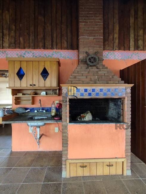Casa 470m² - 4 dormitórios, 5 vagas no bairro Jardim São Pedro
