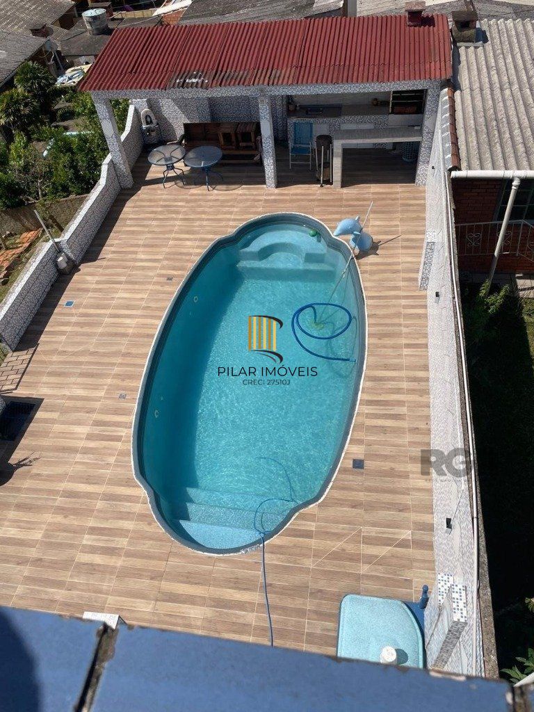 Casa 420m², 4 dormitórios, 3 vagas no bairro Partenon