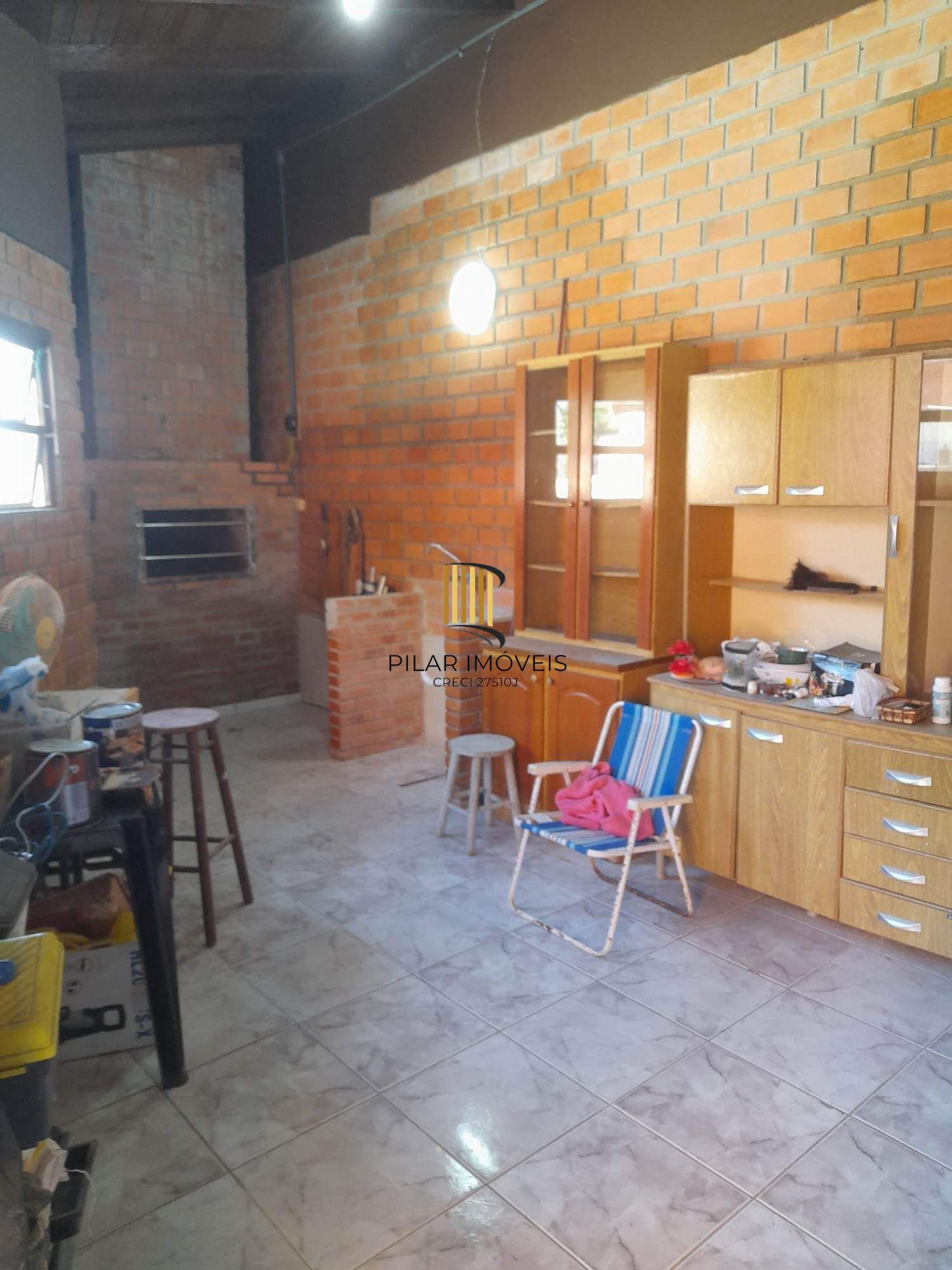 Casa à venda com piscina no bairro Glória, Zona Sul de Porto Alegre – 207m² construídos, pátio amplo e excelente potencial residencial