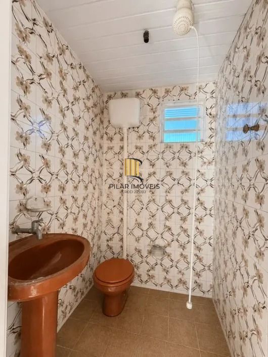 Casa para venda no bairro Medianeira | 3 dormitórios | Pátio amplo | Espaço gourmet | 298m² | Porto Alegre