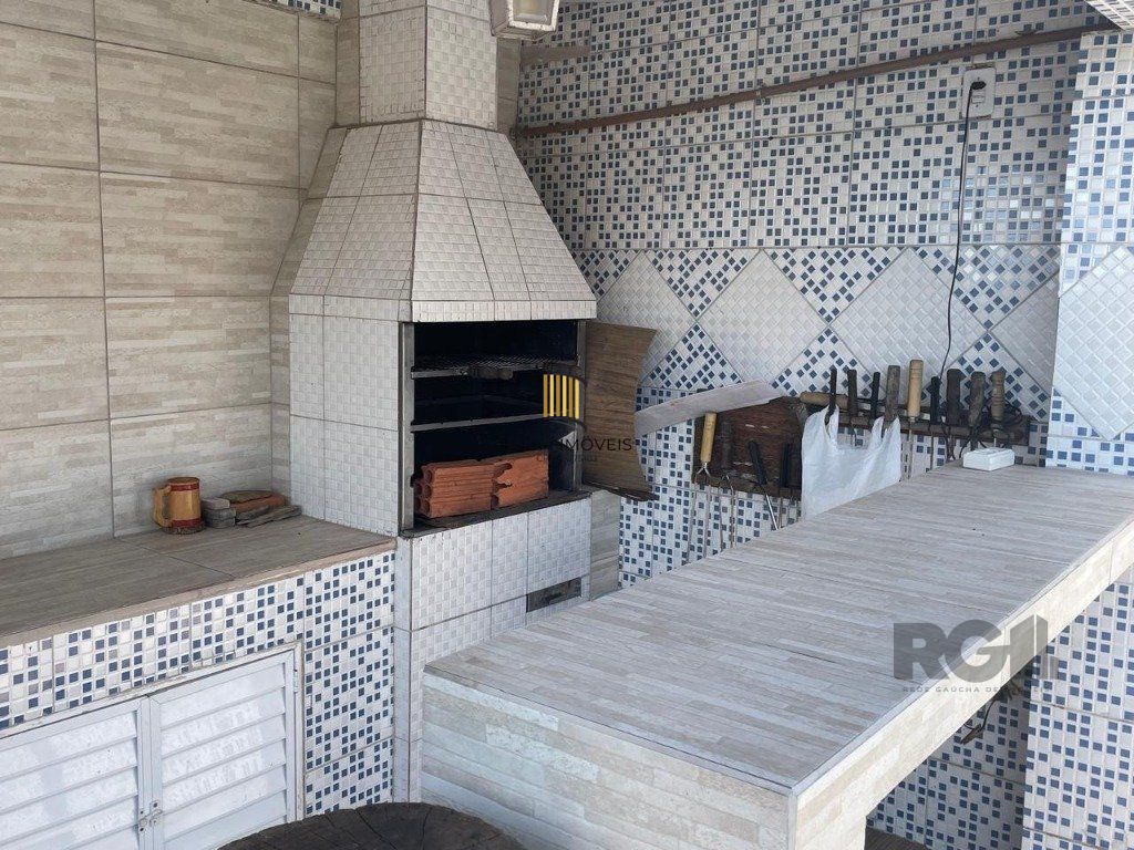 Casa 420m², 4 dormitórios, 3 vagas no bairro Partenon