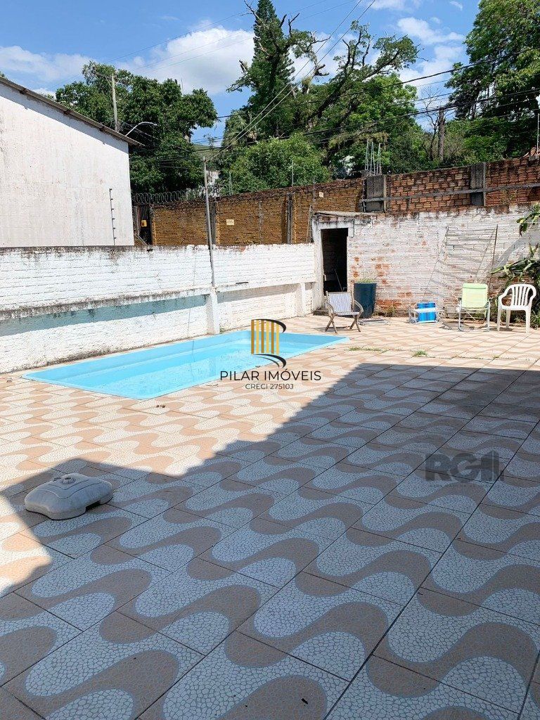 Casa 3 dormitórios no bairro Glória