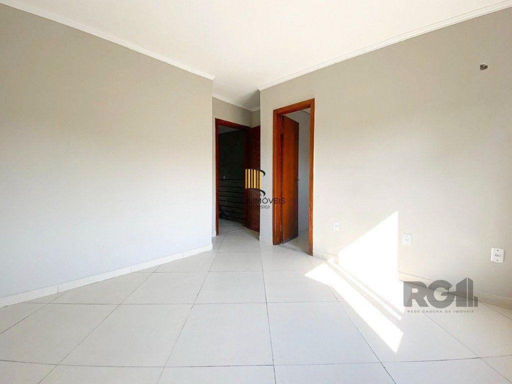 Casa de 3 dormitórios no bairro Mário Quintana