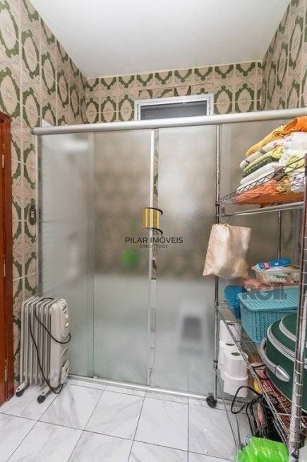 CASA PRÓXIMA AO PONTAL, com 5 vagas, 3 dormitórios!