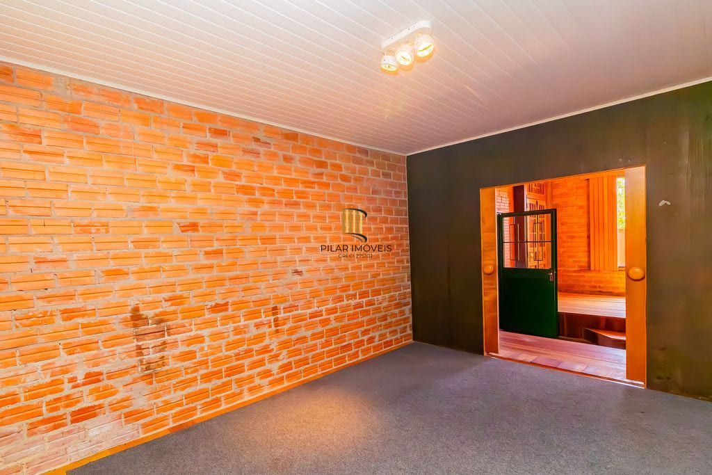Casa de 3 dormitórios, no Bairro Ponta Grossa - Porto Alegre