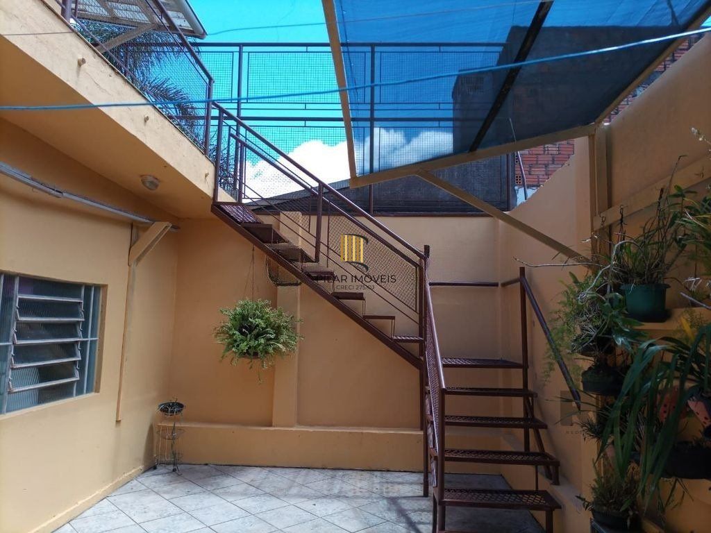 Casa 4 dormitórios no bairro Vila Ipiranga