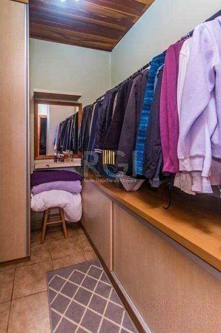 CASA DE 2 DORMITÓRIOS, PISCINA, CHURRASQUEIRA E 2 VAGAS DE GARAGEM NO BAIRRO HÍPICA