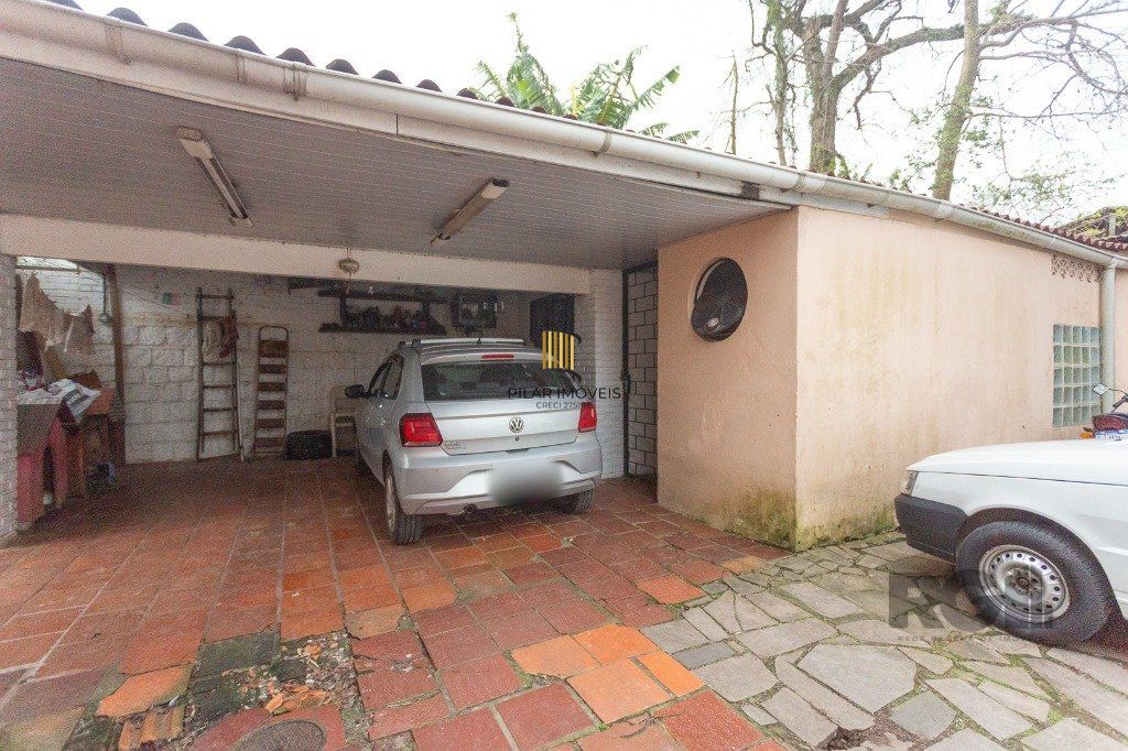 casa de 4 dormitórios no bairro cavalhada