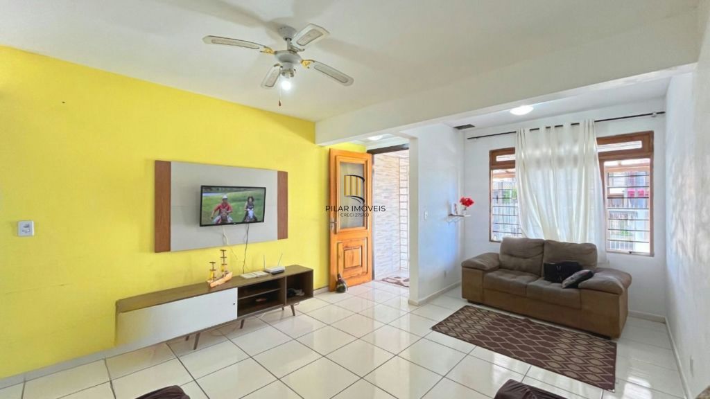 Casa de 2 dormitórios à venda Rua Heitor Kramer, Guarujá - Porto Alegre