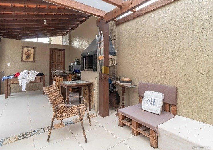 Casa de 3 dormitórios à venda em Ipanema, Porto Alegre.