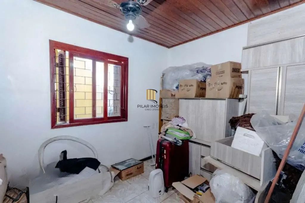 Casa à venda com 3 dormitórios, 1 suíte e espaço gourmet em terreno alto